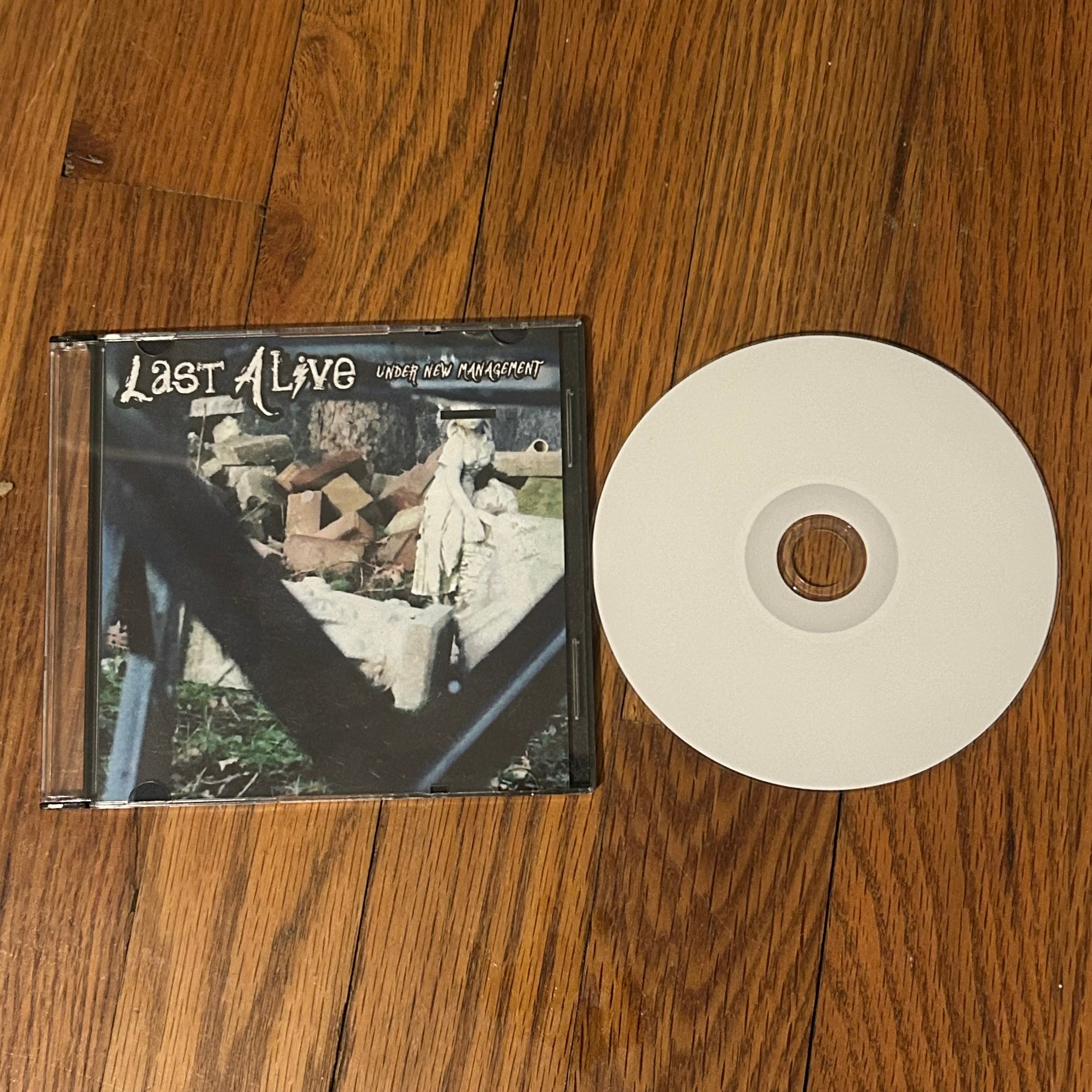Last Alive: Under New Management (2017) Debut EP Reissue - Jet White Disc
